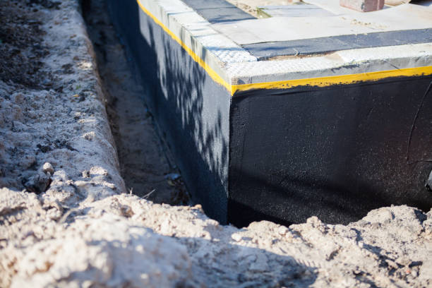 Professional Waterproofing technician working in Macomb, MI